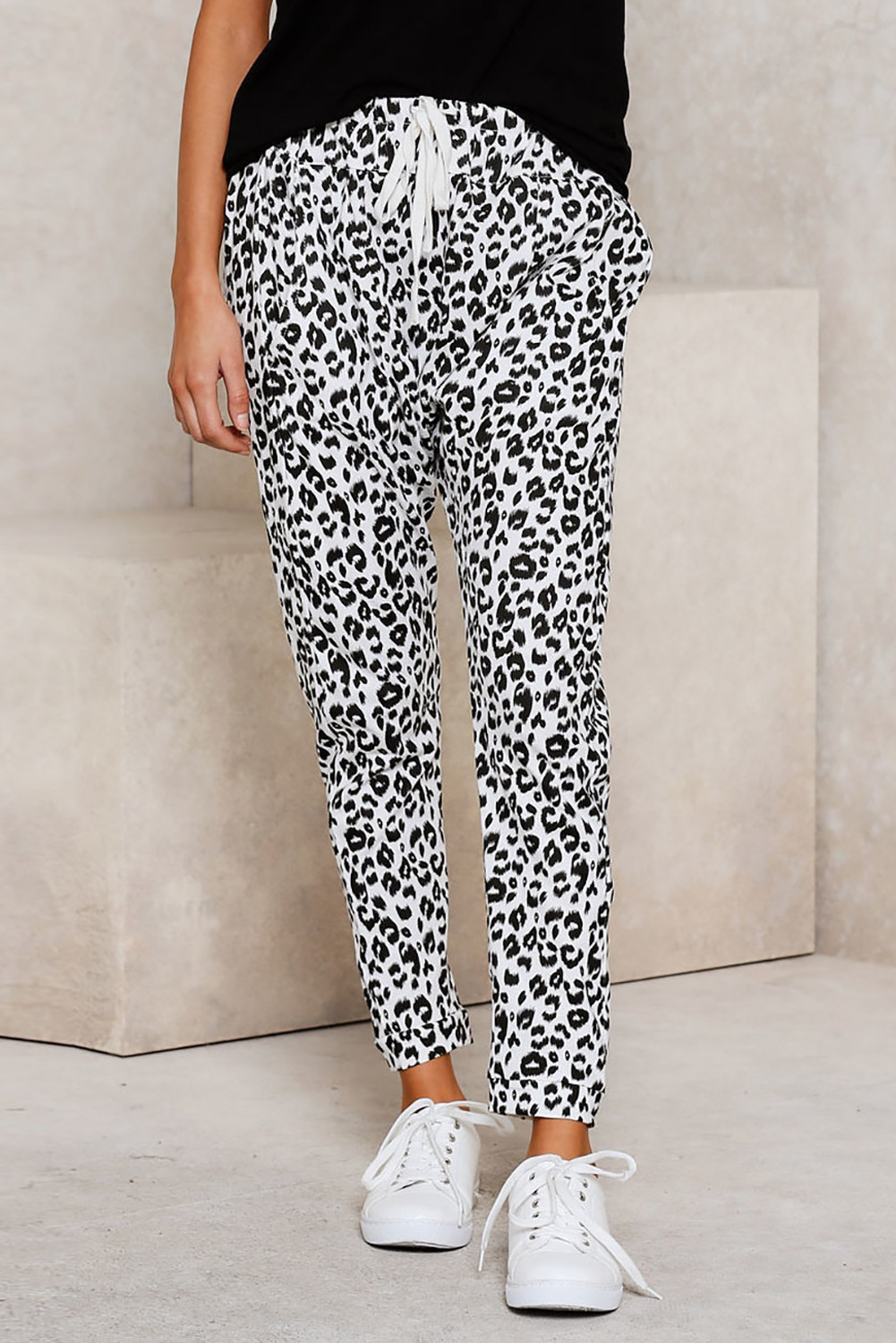 white leopard print trousers